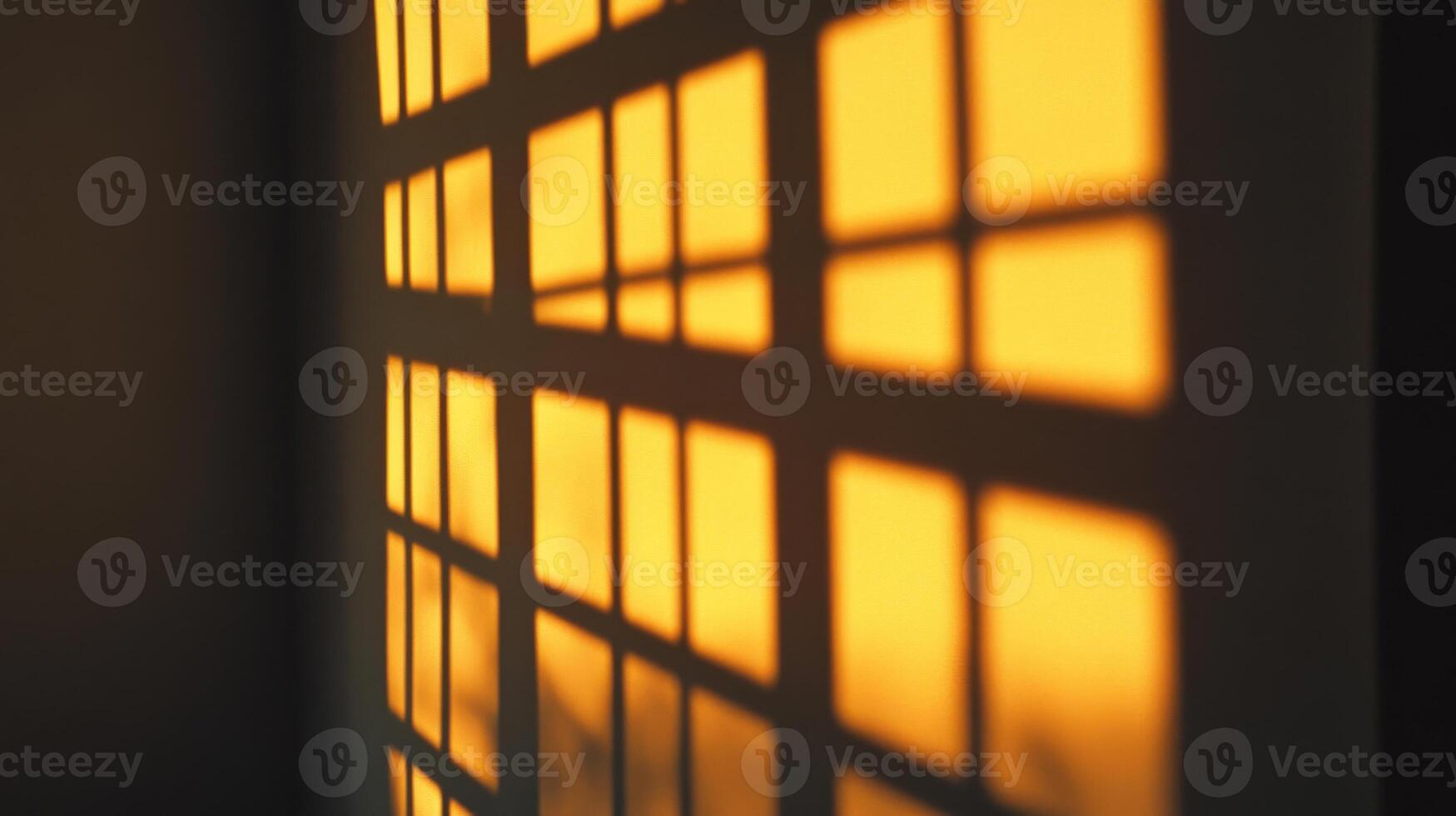 A Window's Shadow Cast by the Setting Sun photo