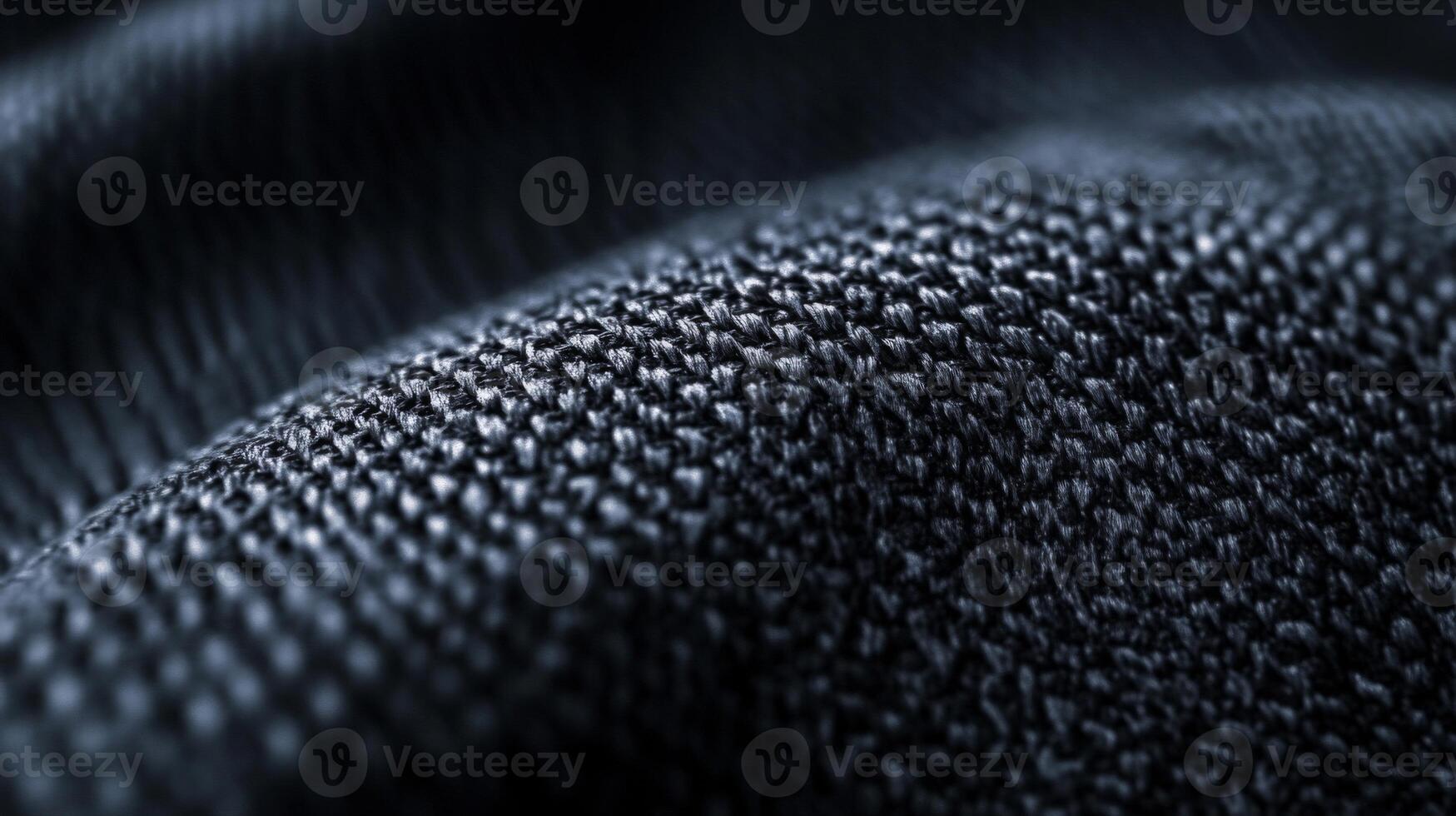 Close-up of Dark Fabric Texture with Wrinkles photo