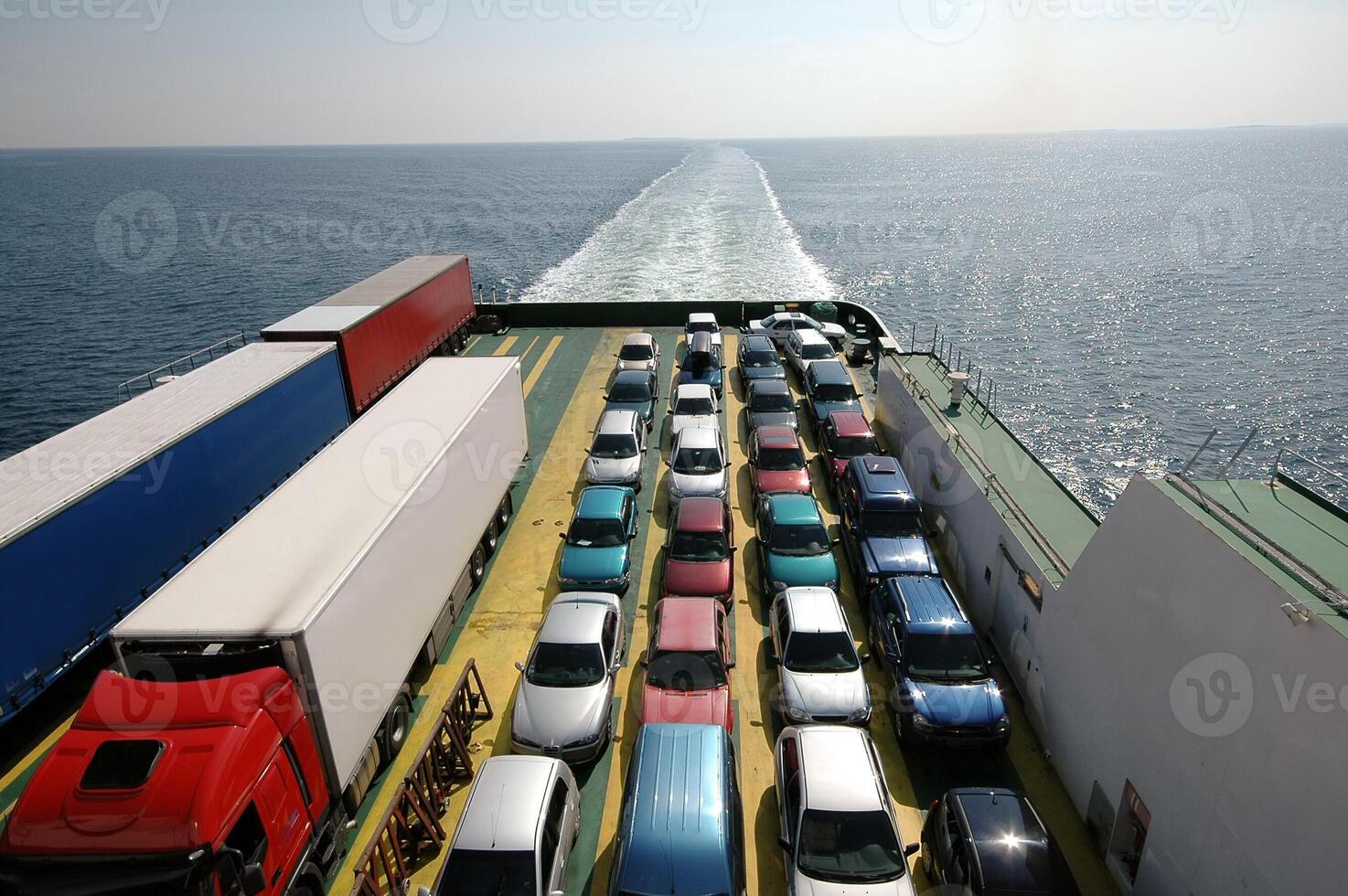Sailing cars on a ferry photo
