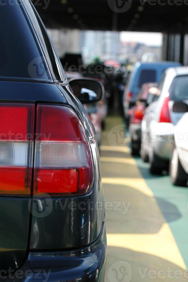 Many waiting cars photo