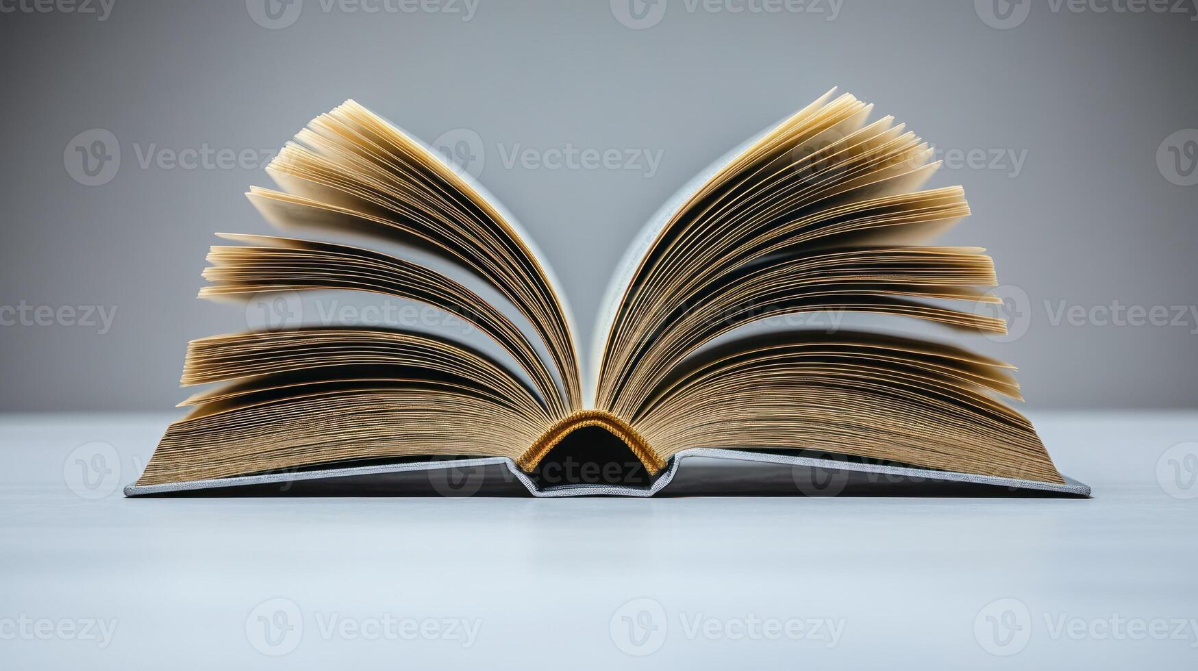 An inviting book lies open, its pages fanned out, ready to share stories and knowledge photo