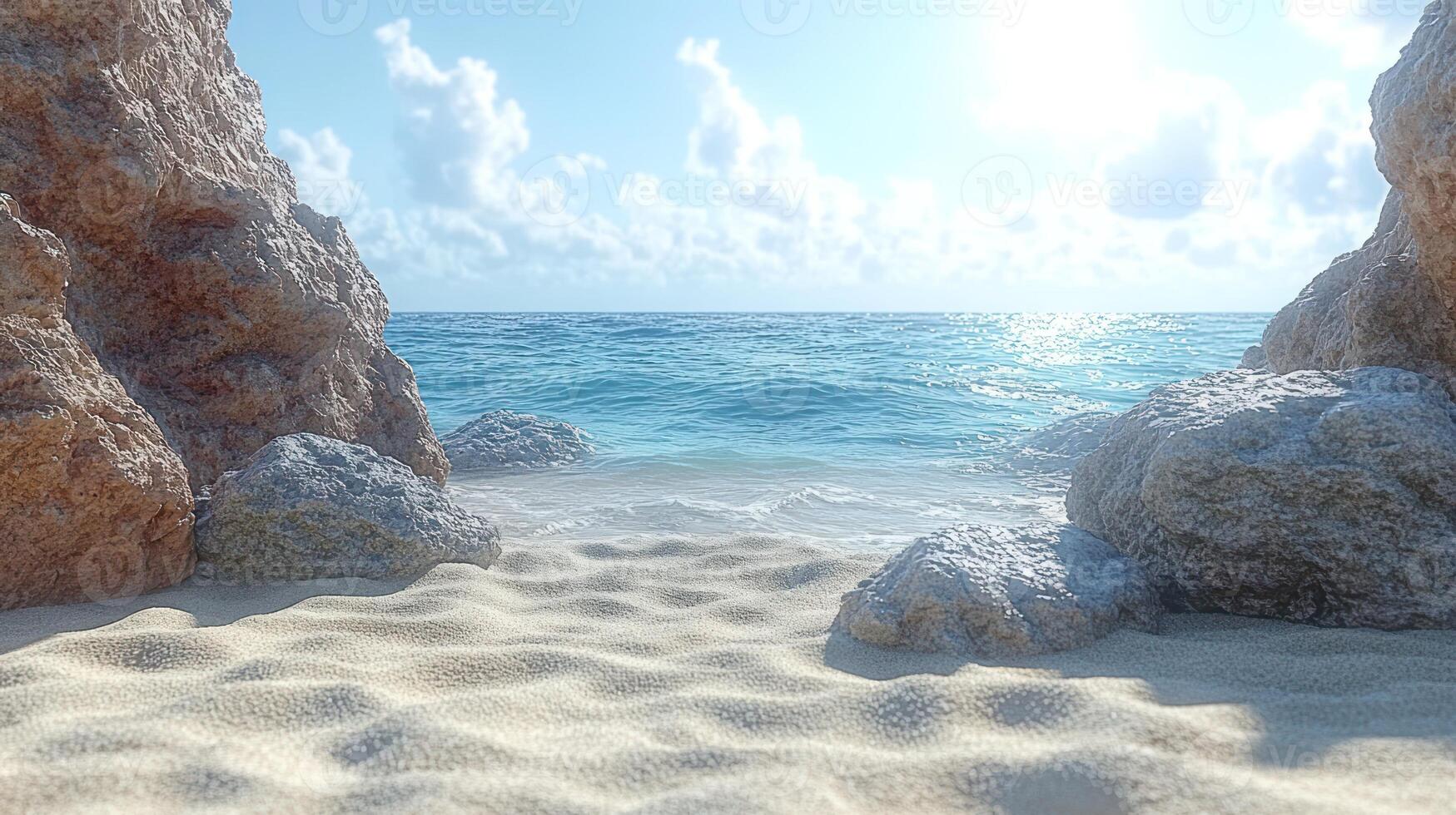 Soft waves lap at a sandy beach framed by rocks under a clear blue sky photo