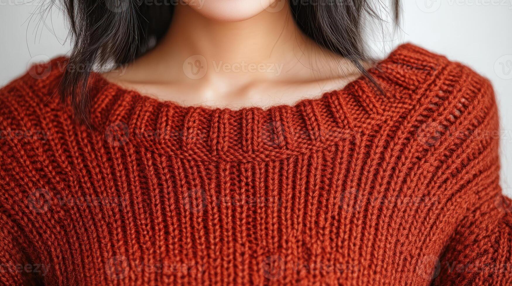 A cozy atmosphere from a woman in a knit sweater, exemplifying autumn style photo