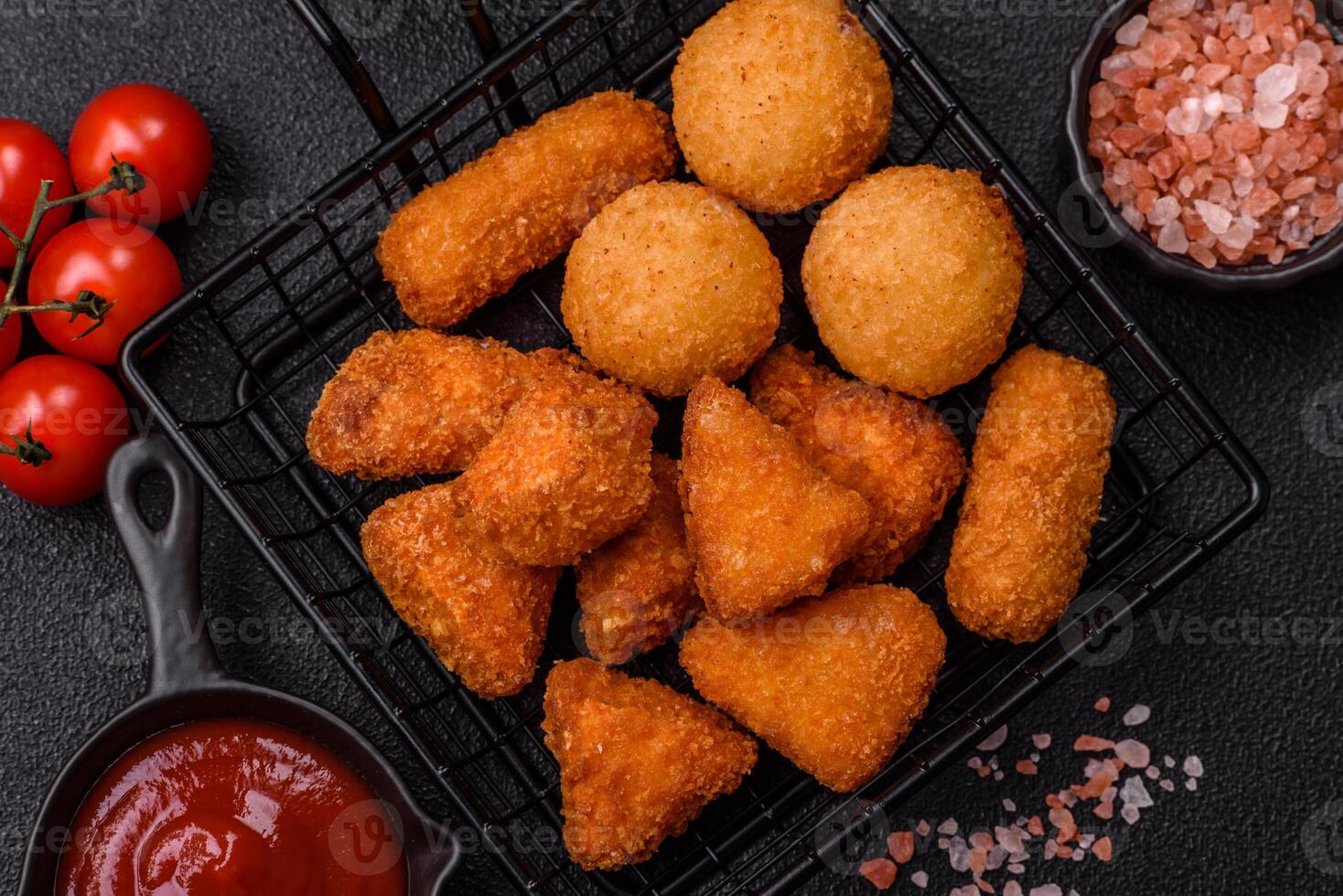 Brie cheese or camembert fries in breading, fast food, takeaway photo