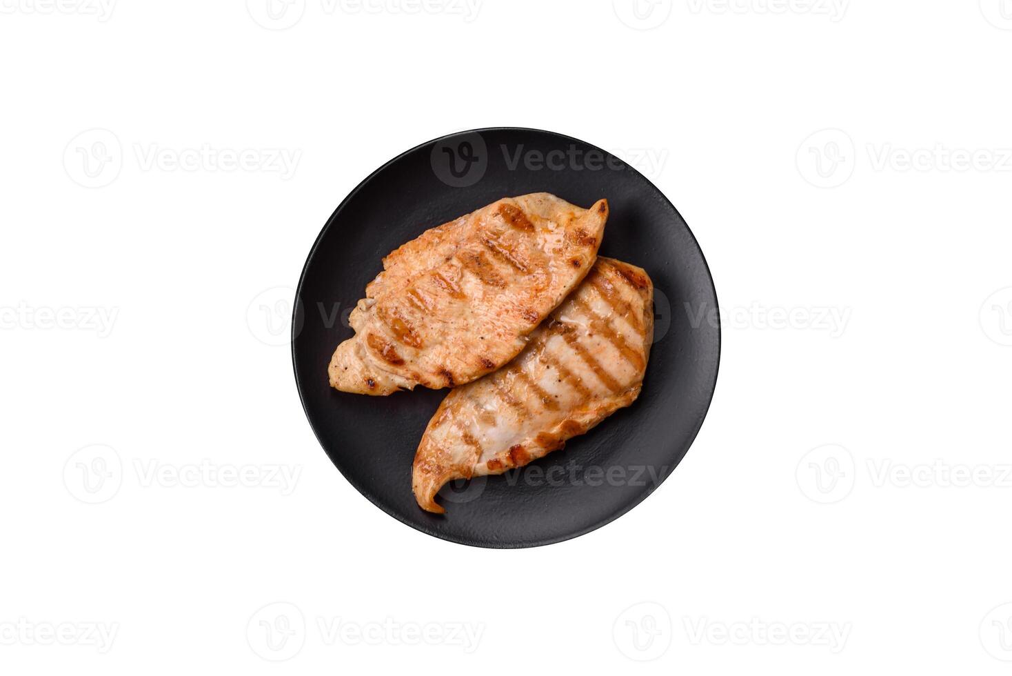 Delicious fresh grilled chicken fillet with spices and herbs photo