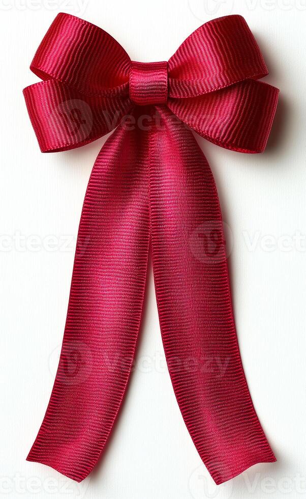 Beautiful red ribbon bow for gift wrapping. A vibrant red ribbon bow lies flat, ready to adorn a gift with festive charm and elegance for special occasions or celebrations. photo
