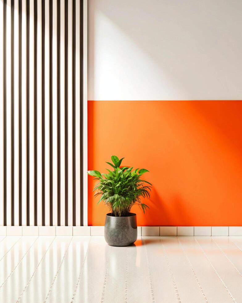A plant in a pot on a white floor next to an orange wall photo