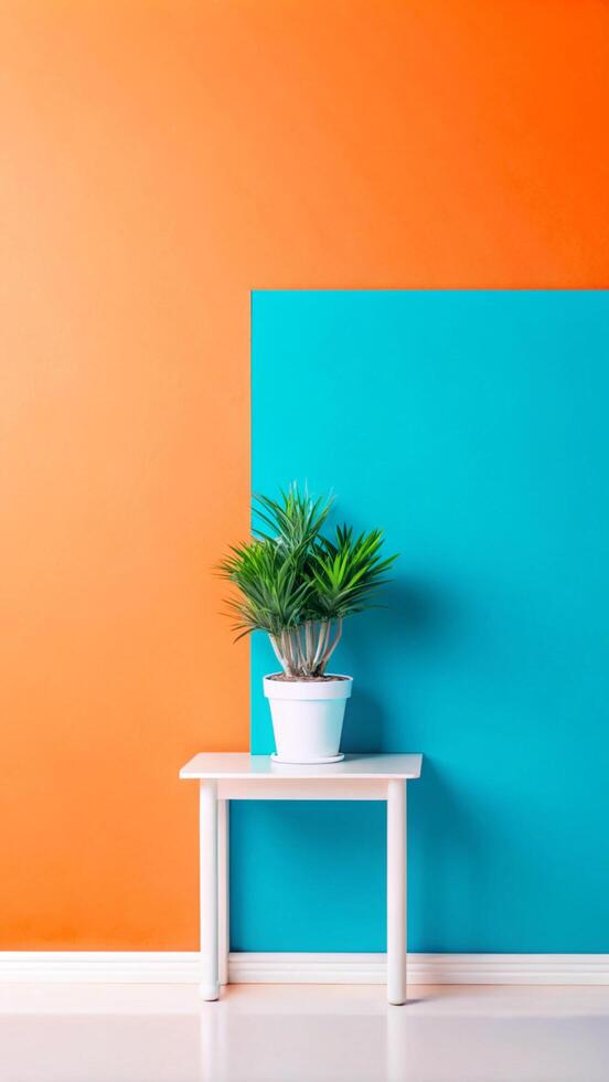 Orange and blue wall with a potted plant photo