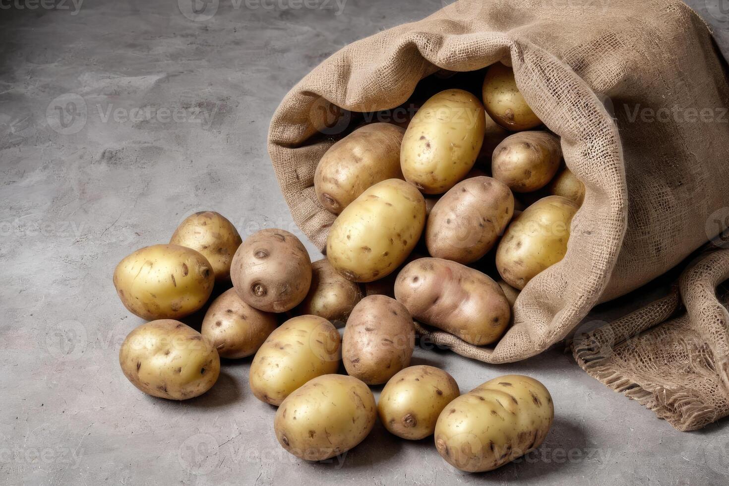 front view burlap sack with potatoes photo