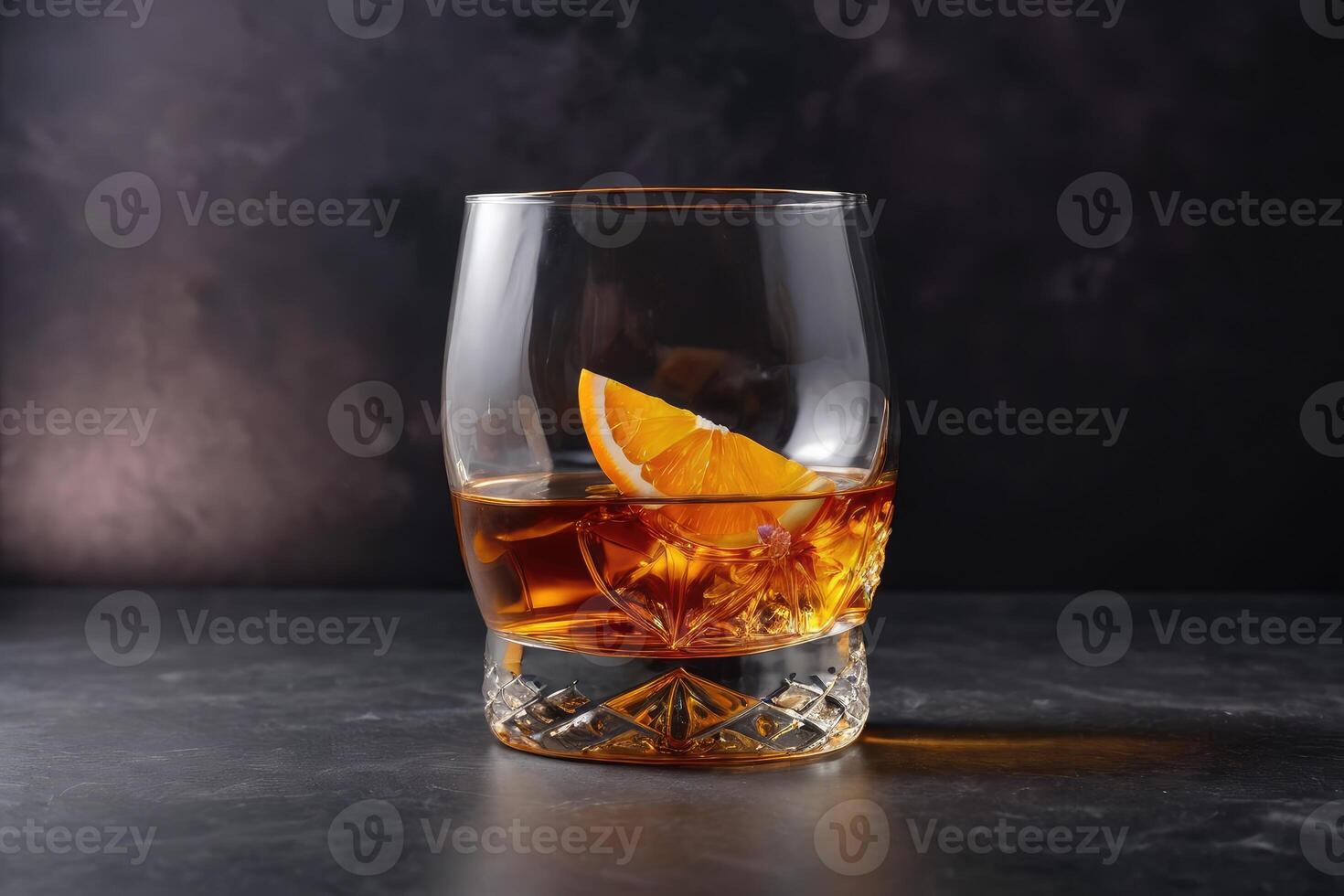 front view whiskey with orange cognac glass with copy space photo