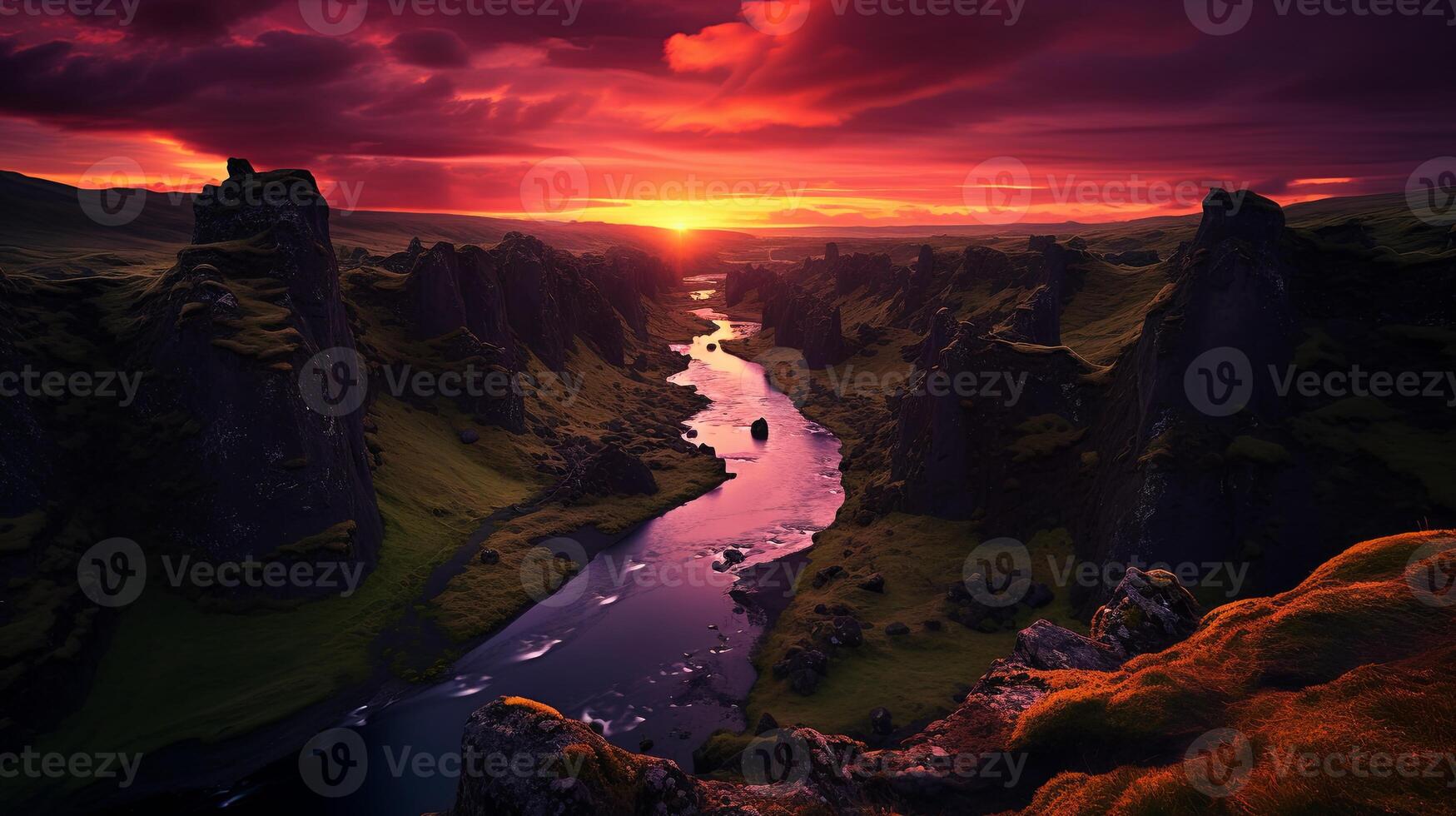A river runs through a valley at sunset photo