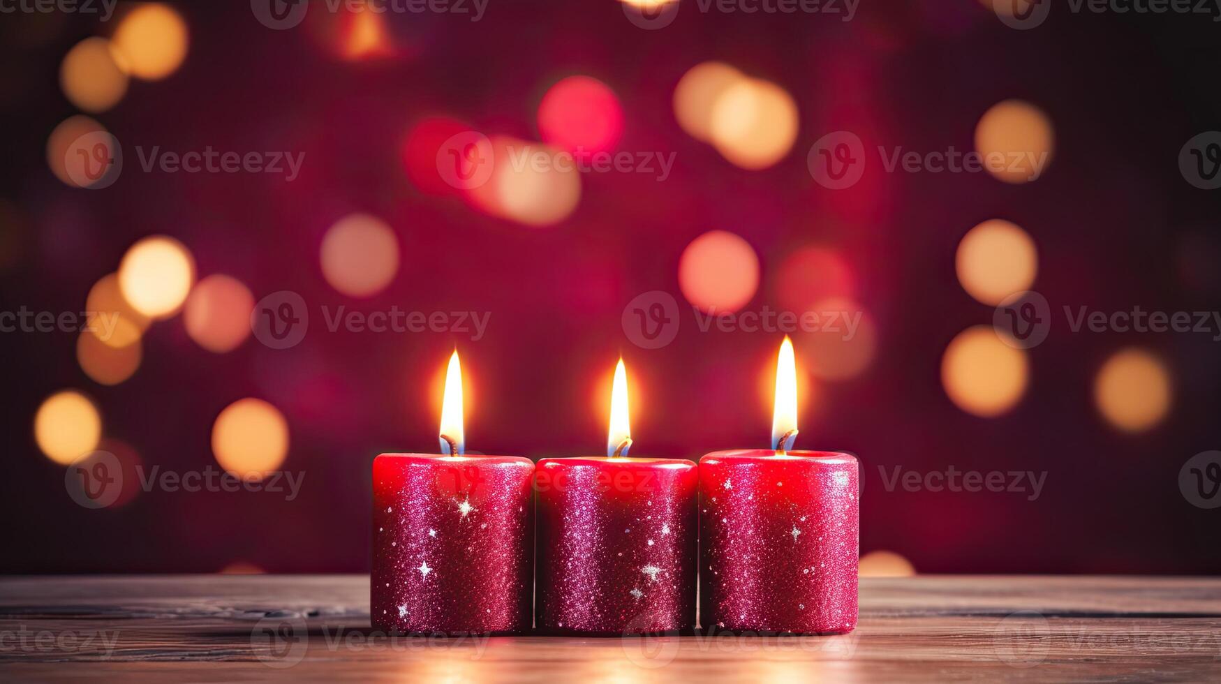 Three red candles on a wooden table with a blurred background photo