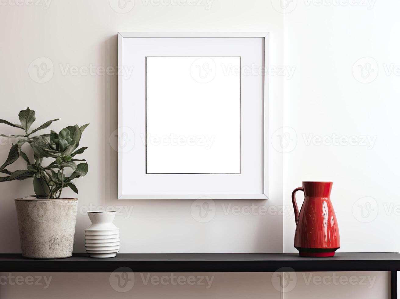 A white frame sits on a shelf next to a red vase photo