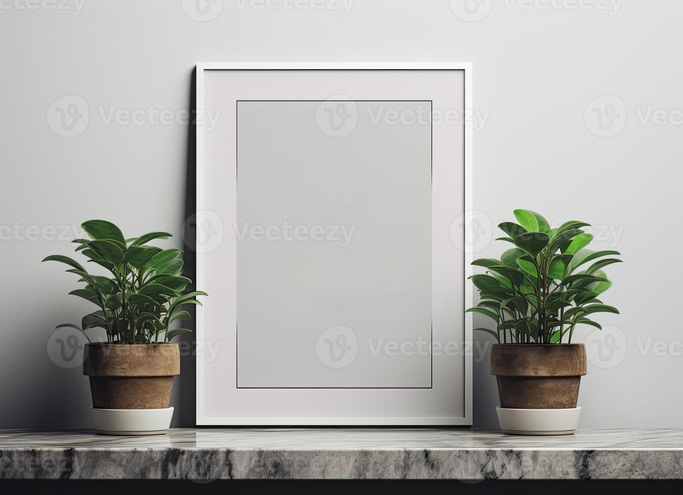 A blank frame with two potted plants on a table photo