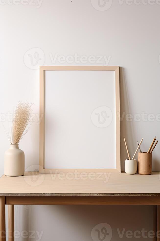Blank frame mockup on a wooden table photo