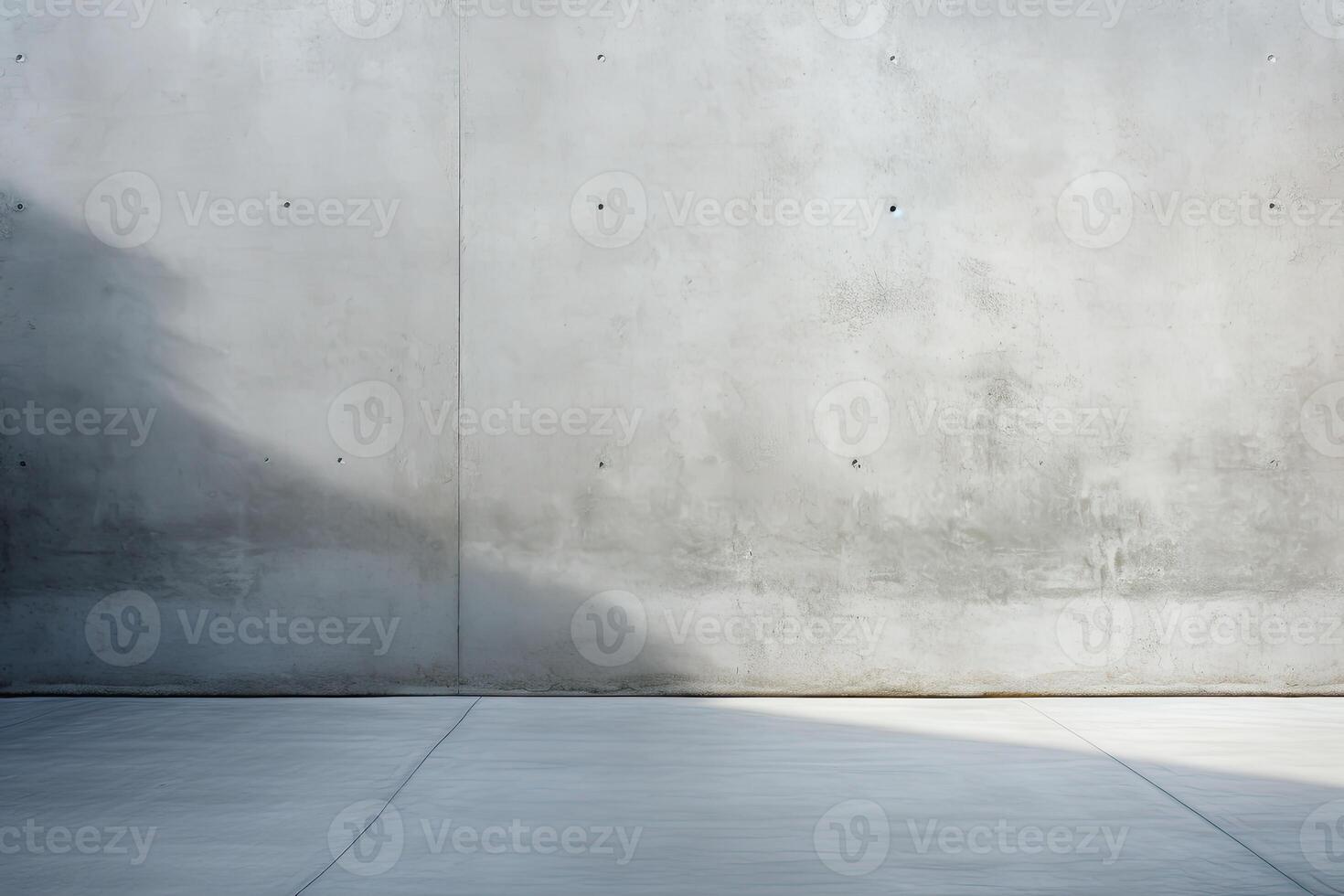 An empty concrete wall with a light shining on it photo
