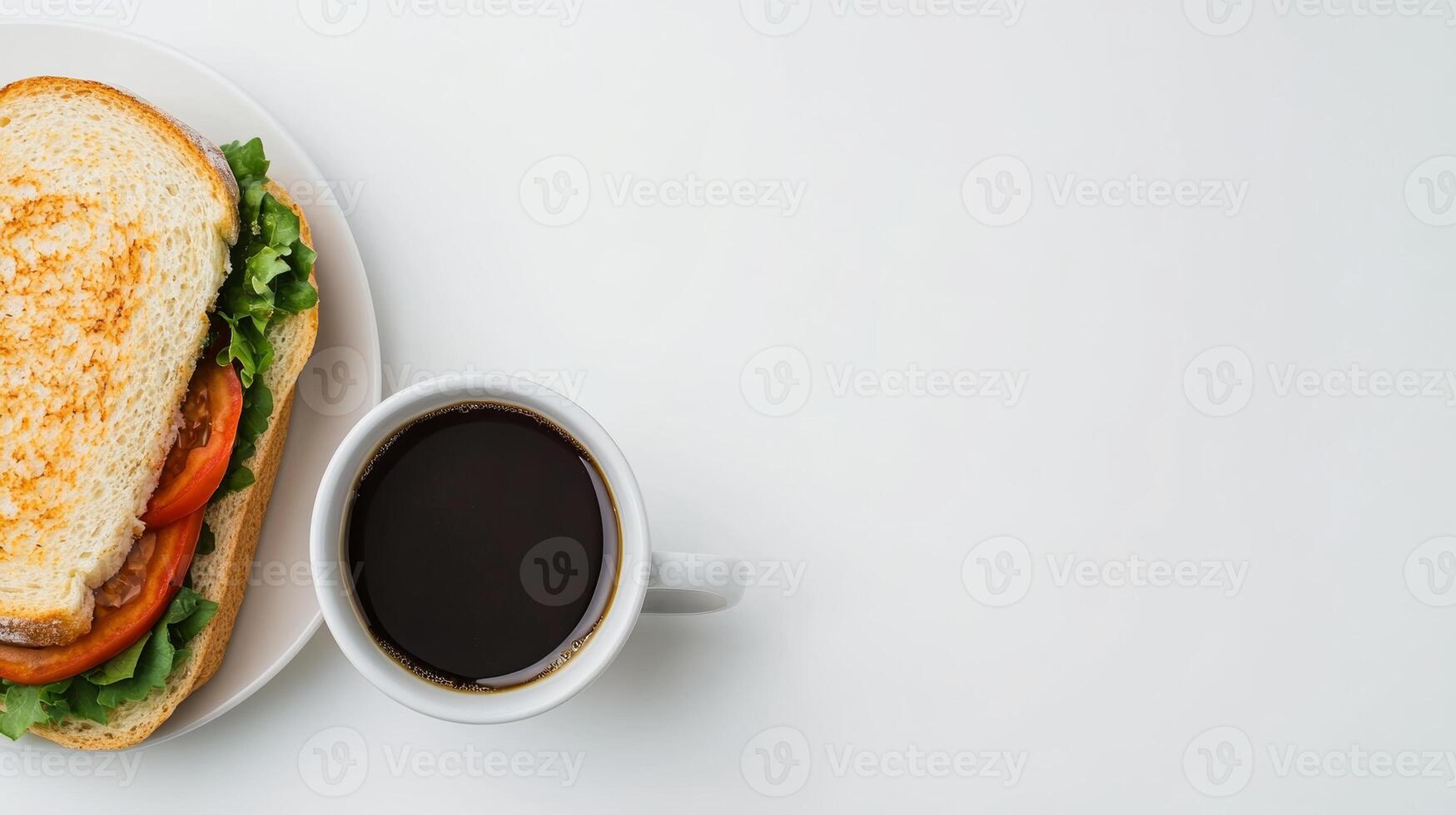 Delicious Sandwich and Coffee on a White Table - Perfect Lunch Break Setup with Copy Space photo