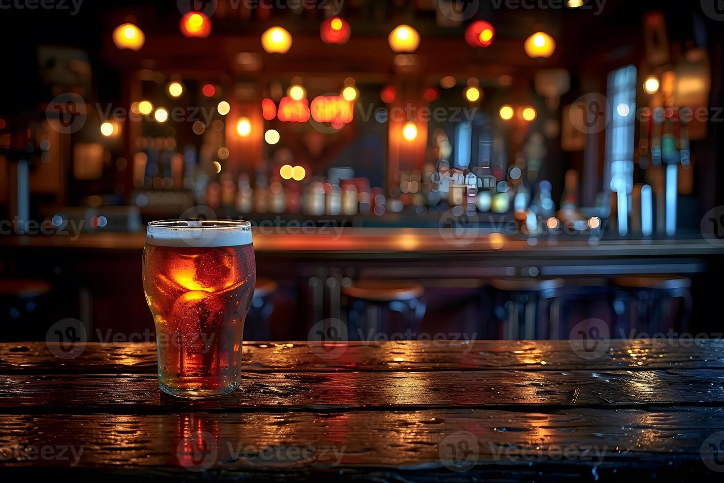 Cozy Pub Ambiance with a Pint of Amber Beer on a Rustic Bar Counter photo
