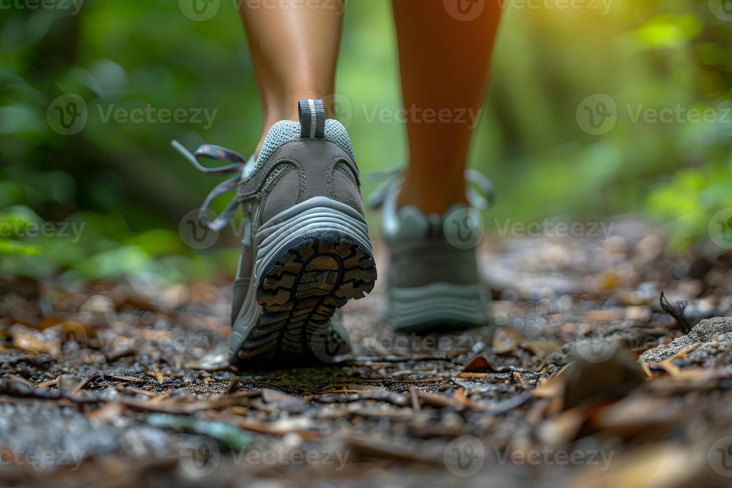 Active Lifestyle Hiking Adventure in Forested Trail with Sunlit Background photo