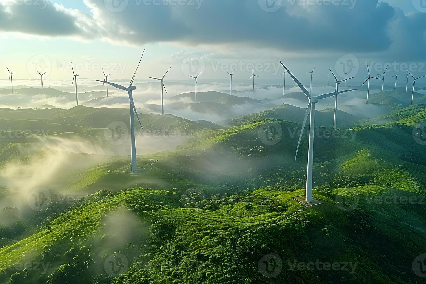 Sustainable Energy Wind Turbines on Foggy Green Hills at Sunrise - Ideal for Environmental Posters photo