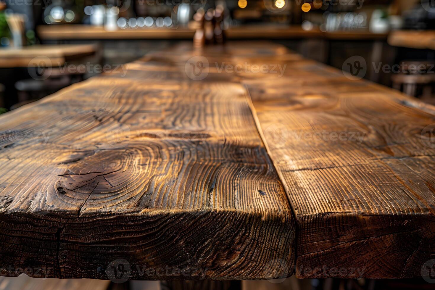 Rustic Wooden Table Surface in Cozy Cafe Setting Ideal for Backgrounds and Design Projects photo