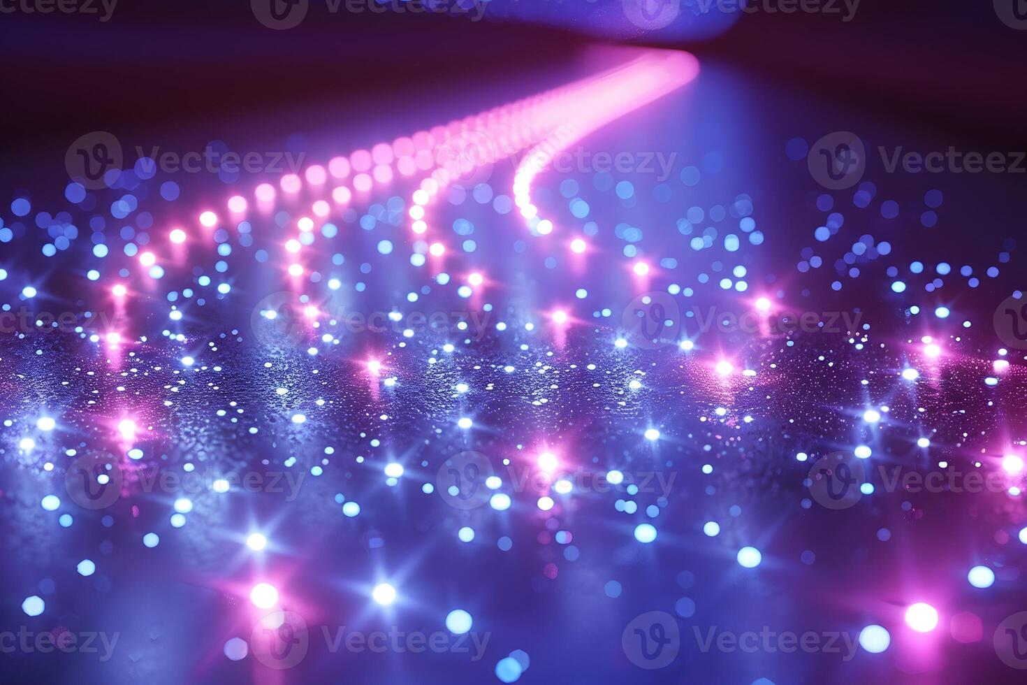 Vibrant Neon Lights and Glittering Sparkles on a Dark Surface for Futuristic Design photo
