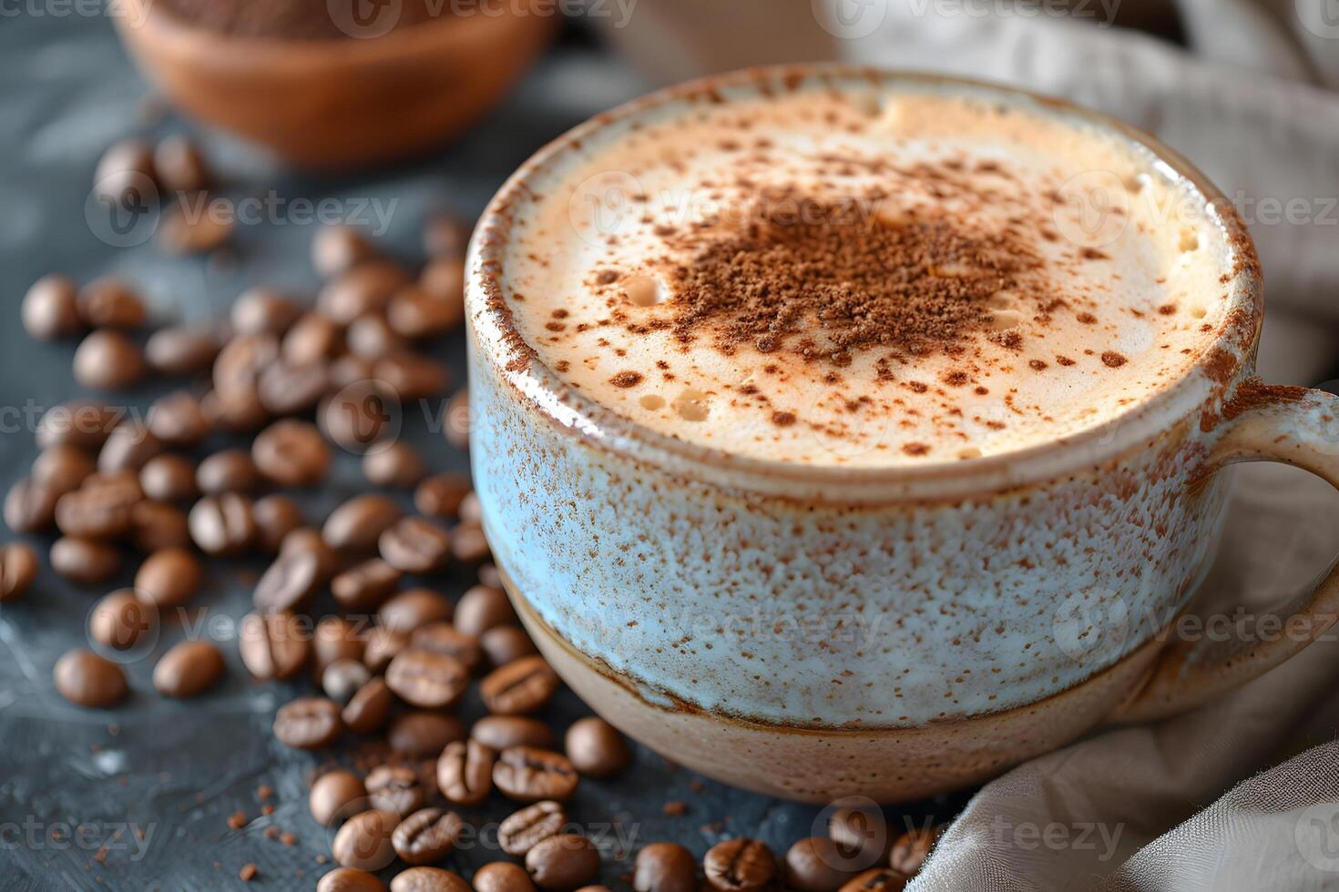Rustic Cappuccino with Cocoa Topping in Ceramic Mug Surrounded by Coffee Beans photo