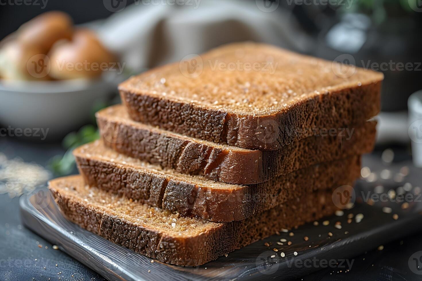 Stack of Freshly Baked Whole Wheat Bread Slices on Rustic Cutting Board photo