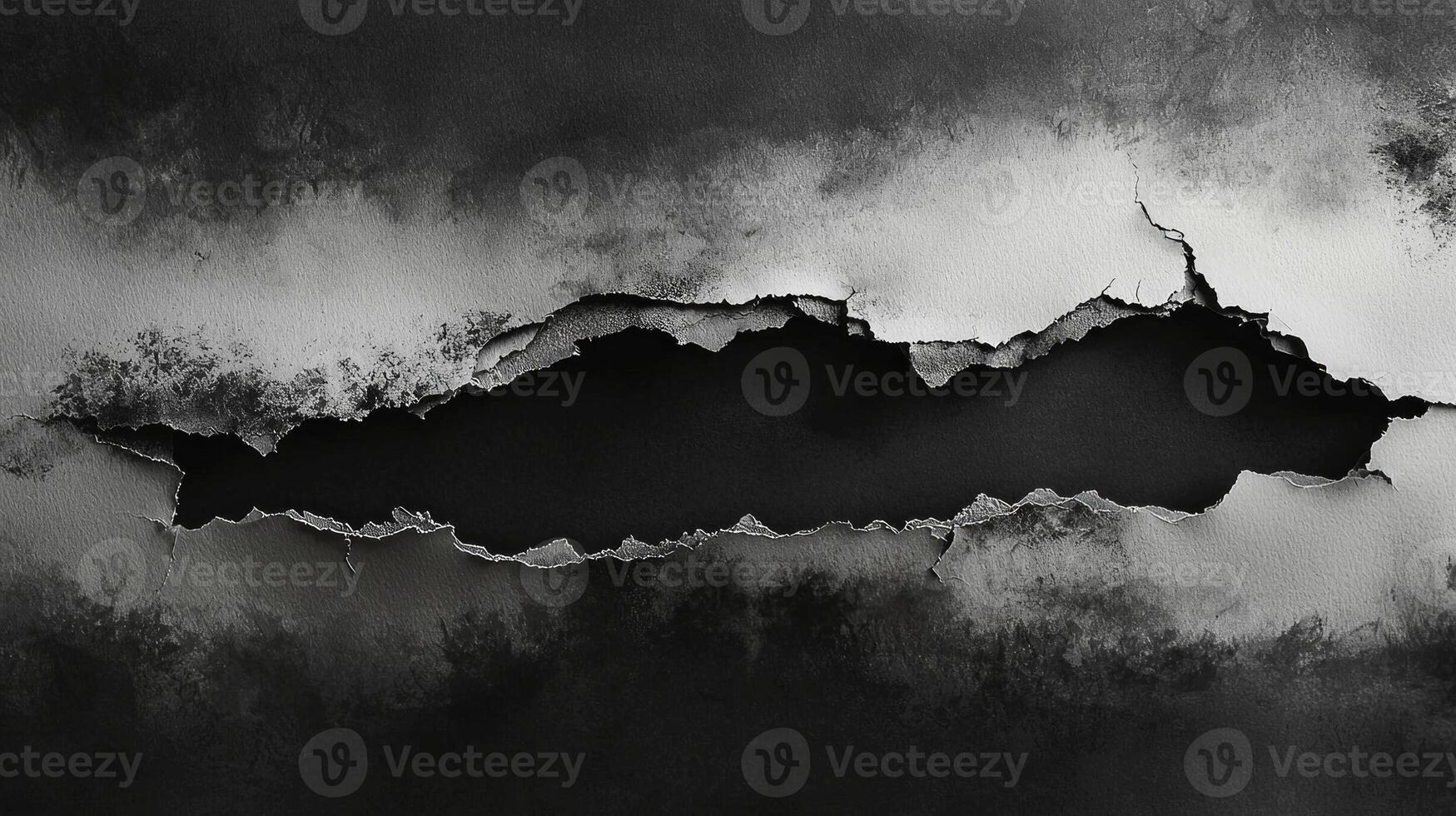 meticulously torn sheet exposes a stark dark backdrop underneath highlighting intricate edges that evoke artistic inspiration and creativity. photo