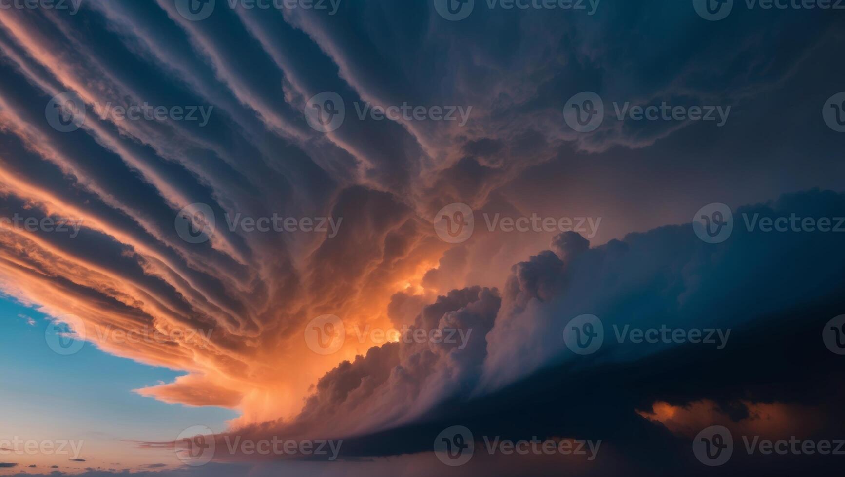 Vivid storm clouds at dusk displaying striking colors of orange and blue. photo