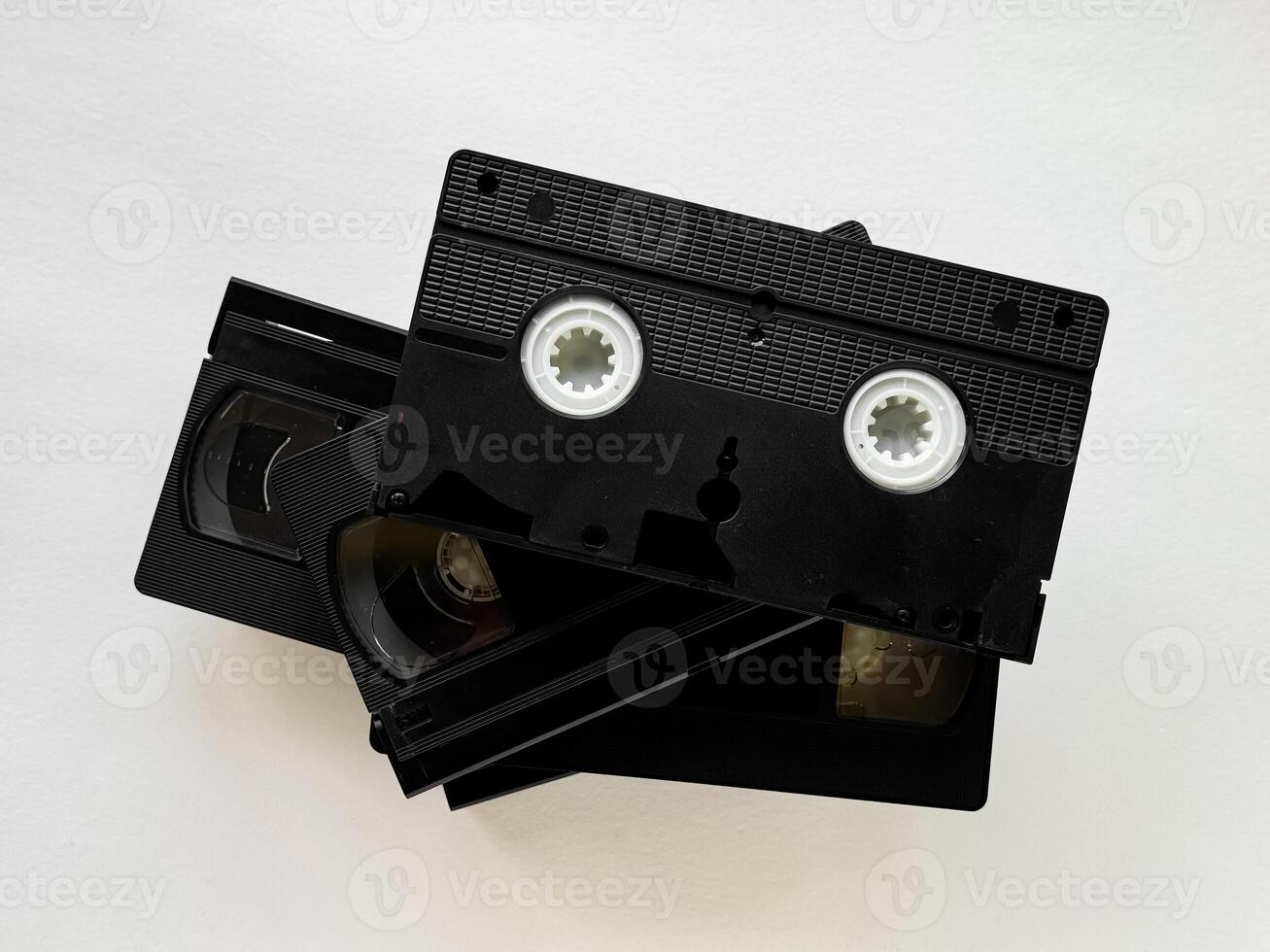 Vintage vhs cassettes on white background highlighting retro technology and 80s nostalgia photo