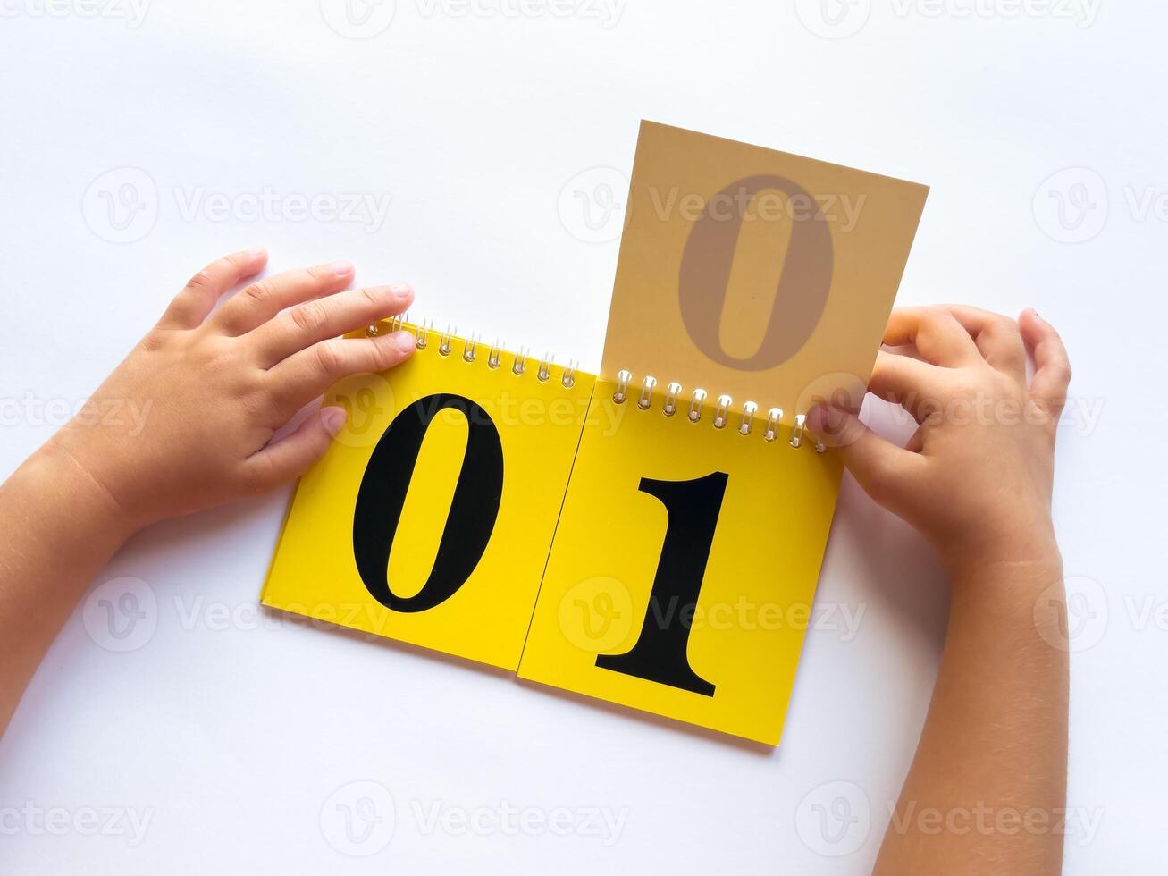 Child learning numbers with interactive flip book photo