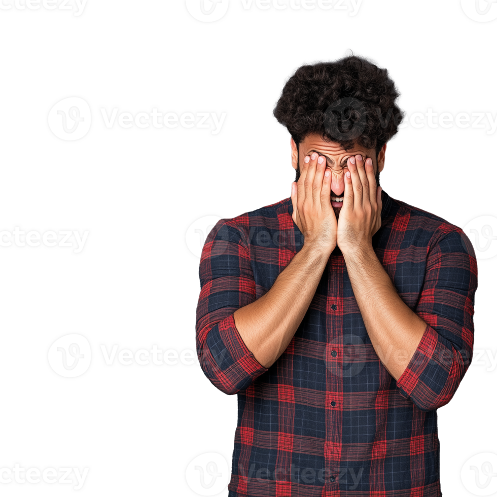 Man covering his face with both hands, wearing a plaid shirt, in a playful gesture, on a transparent background. png