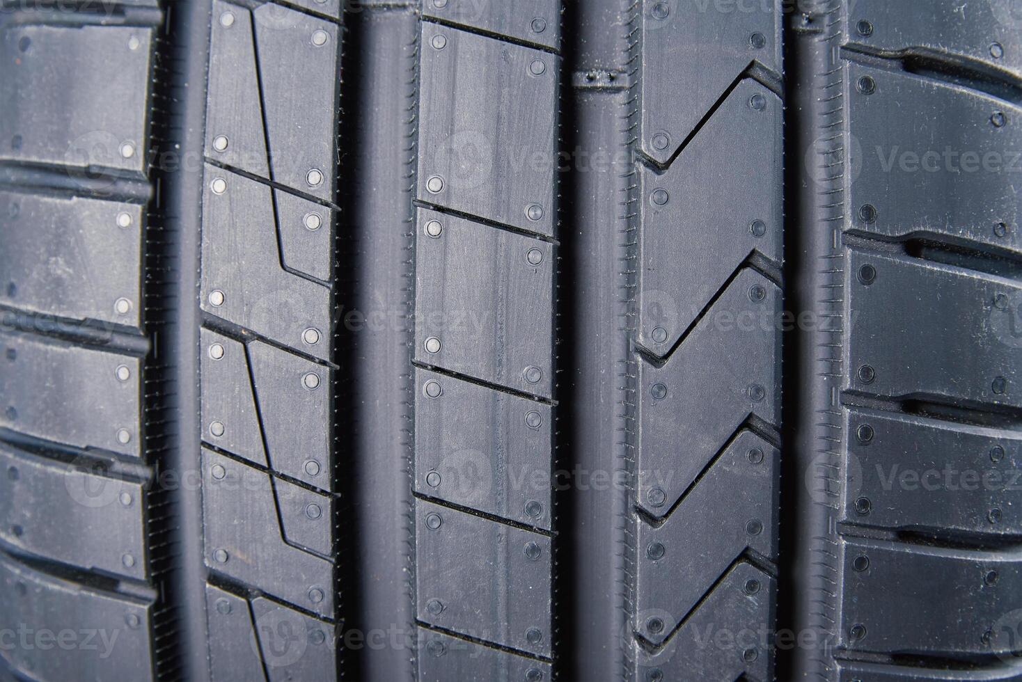 Close up on new summer tire with tread pattern photo