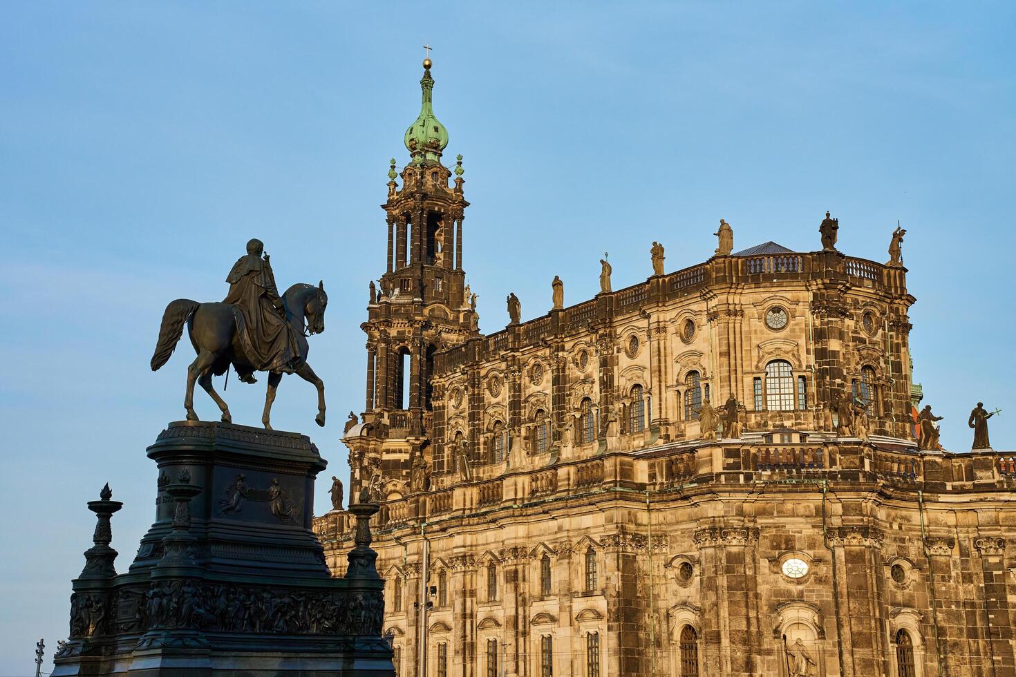 View of ornate lamp post and equestrian statue in front of Dresden castle. Historical architecture in Germany. Dresden, Germany - May 04, 2024 photo
