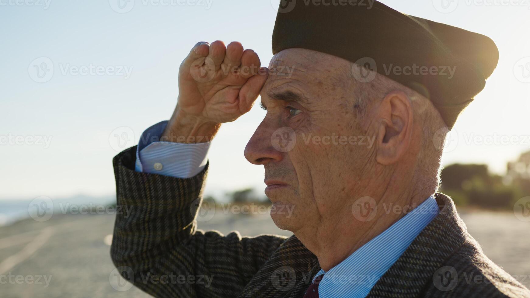 United States Veteran Greets The Arrival Of Marines On The Beach Near The Ocean photo