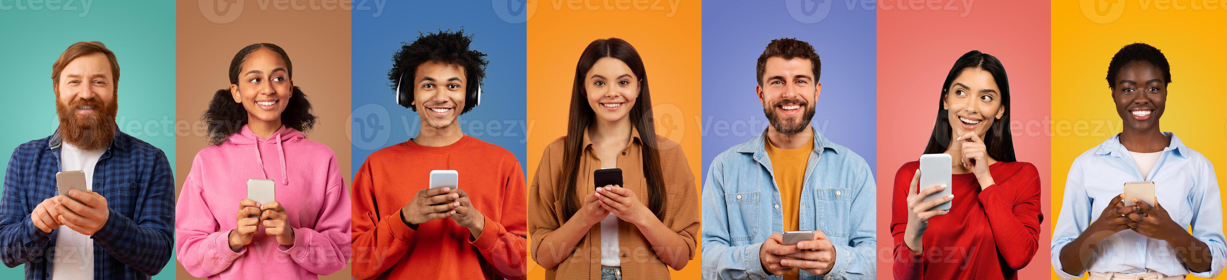 A group of seven friends, smiling and engaged with their smartphones, stands in front of vibrant, contrasting backgrounds. Each person displays unique expressions and styles. photo