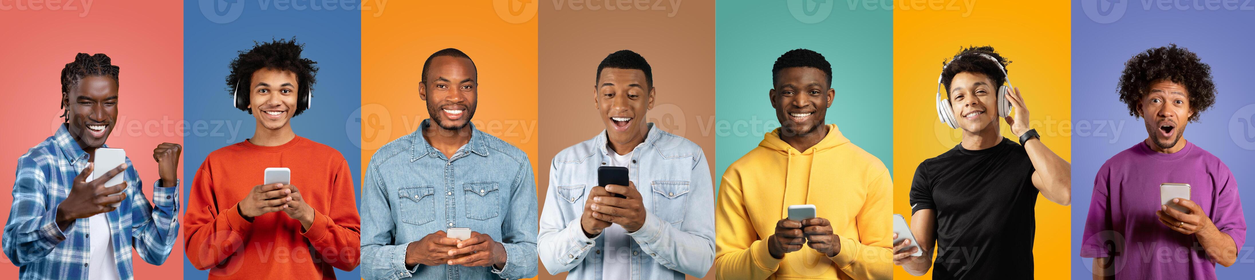 A vibrant gathering of young men smiles and interacts with their smartphones. They display various expressions of amusement and curiosity while standing against colorful backgrounds. photo