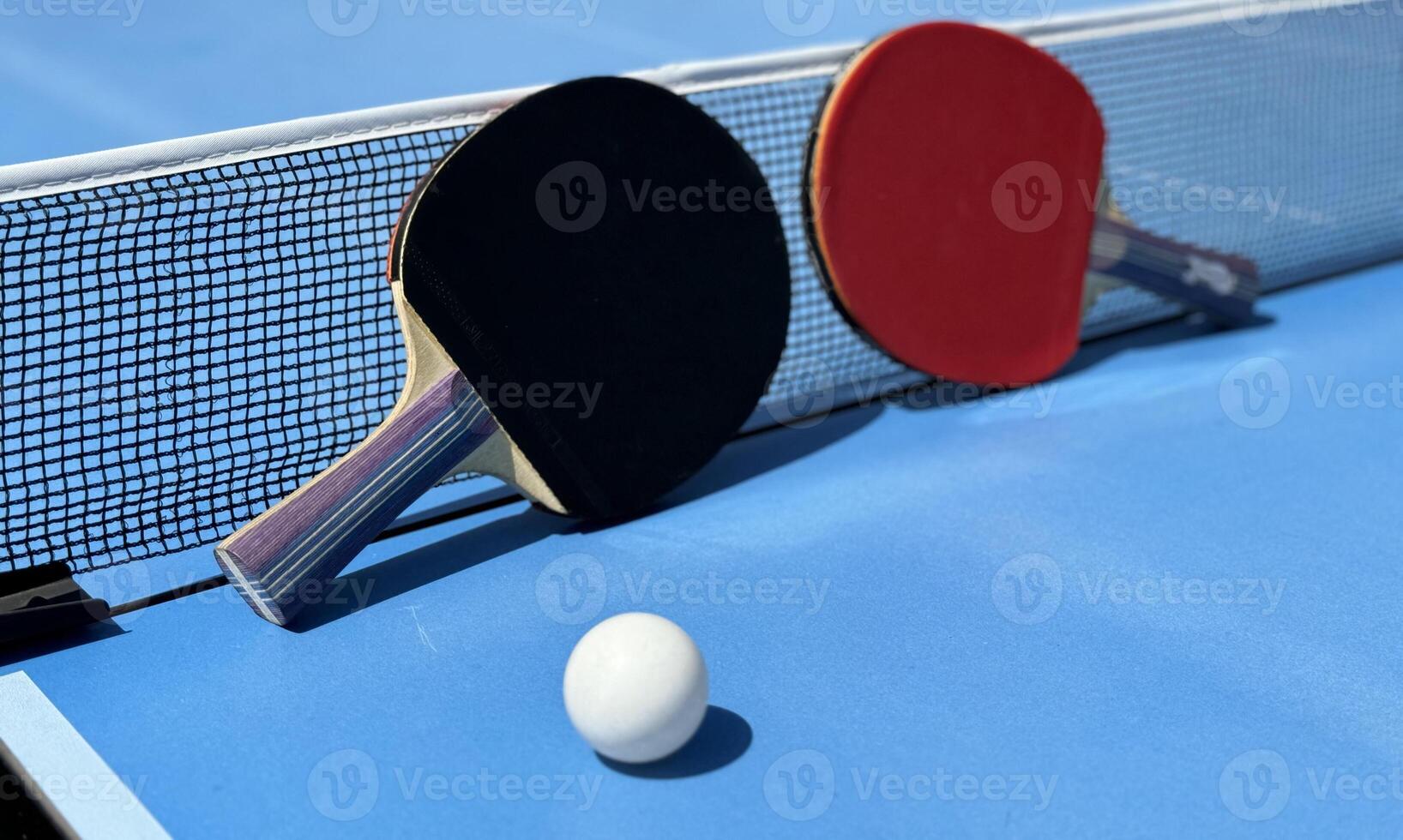 Table tennis rackets and ball photo