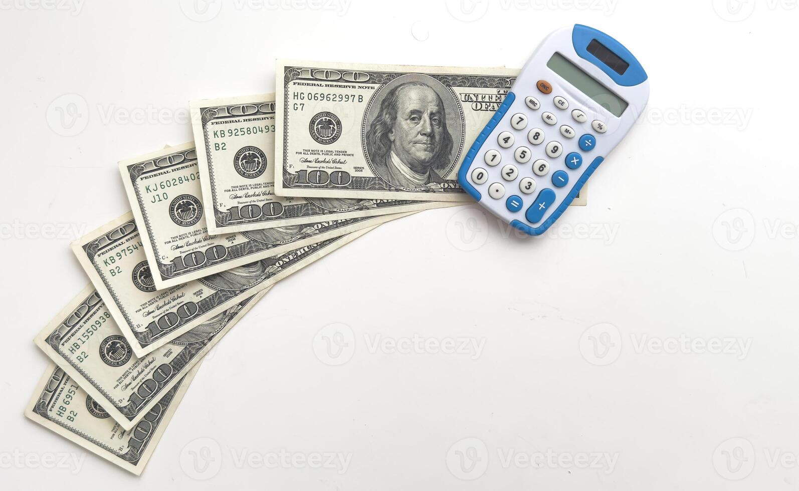 Many dollar bills with calculator. Business concept. photo