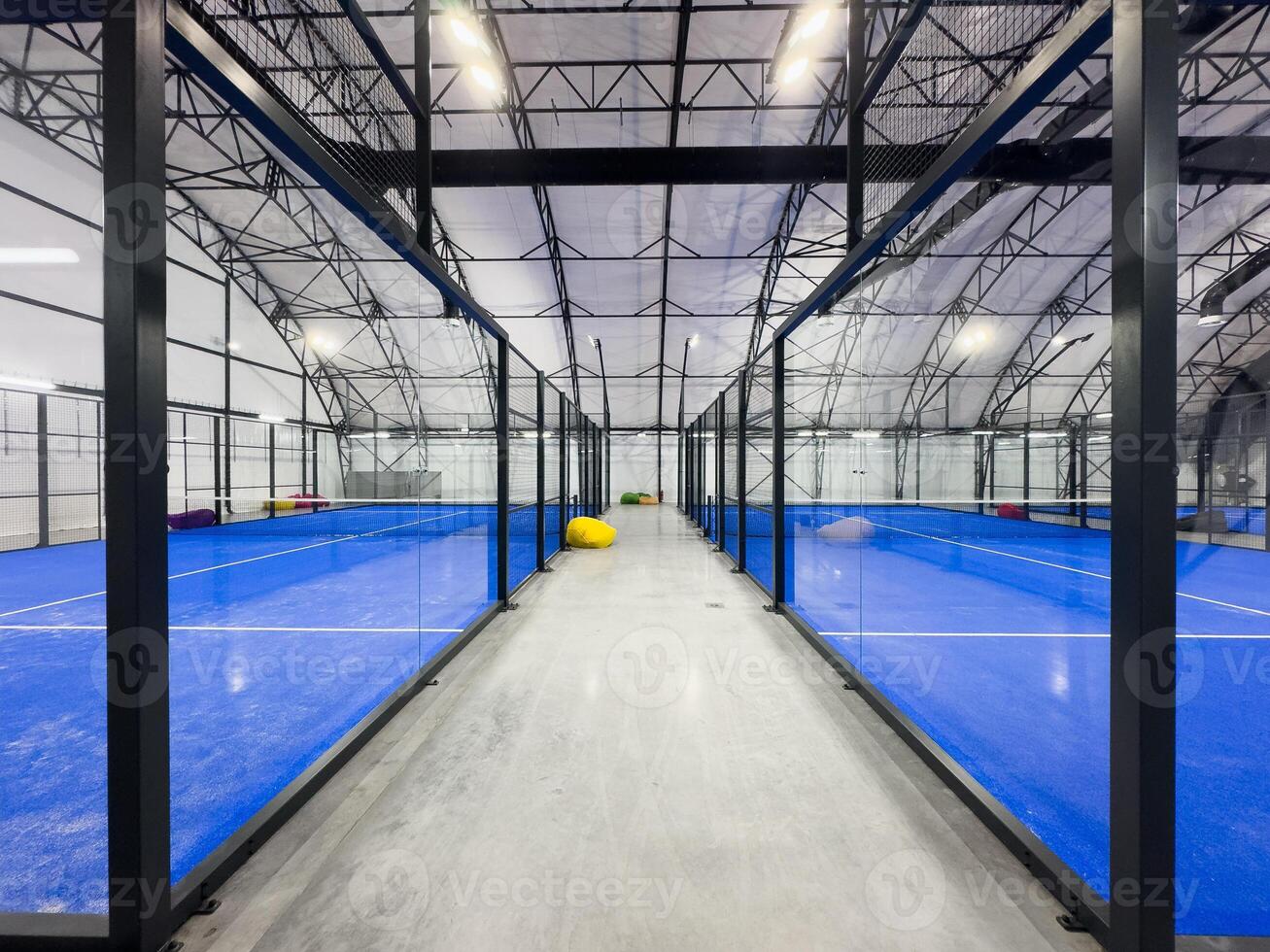 Padel court with lines and net indoor photo