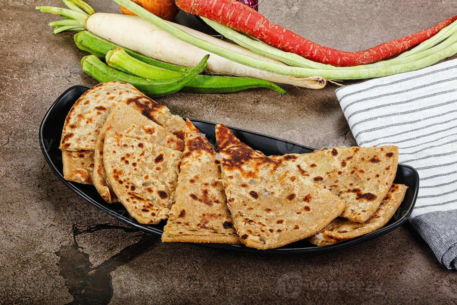 Indian Aloo Paratha - bread with potato photo
