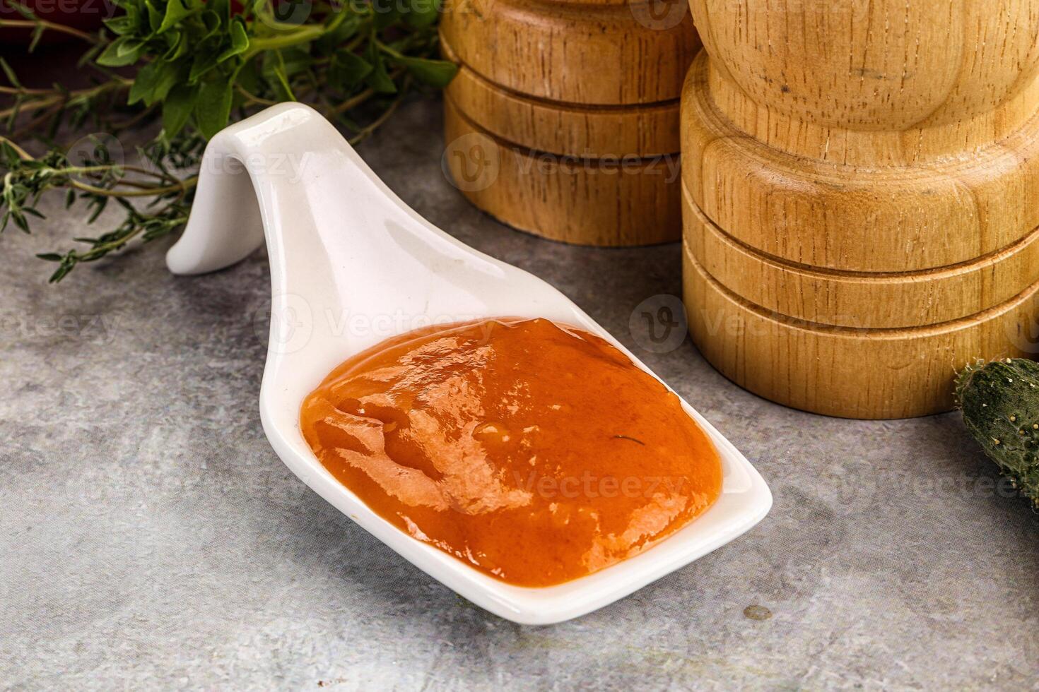 Tasty burger sauce in the bowl photo