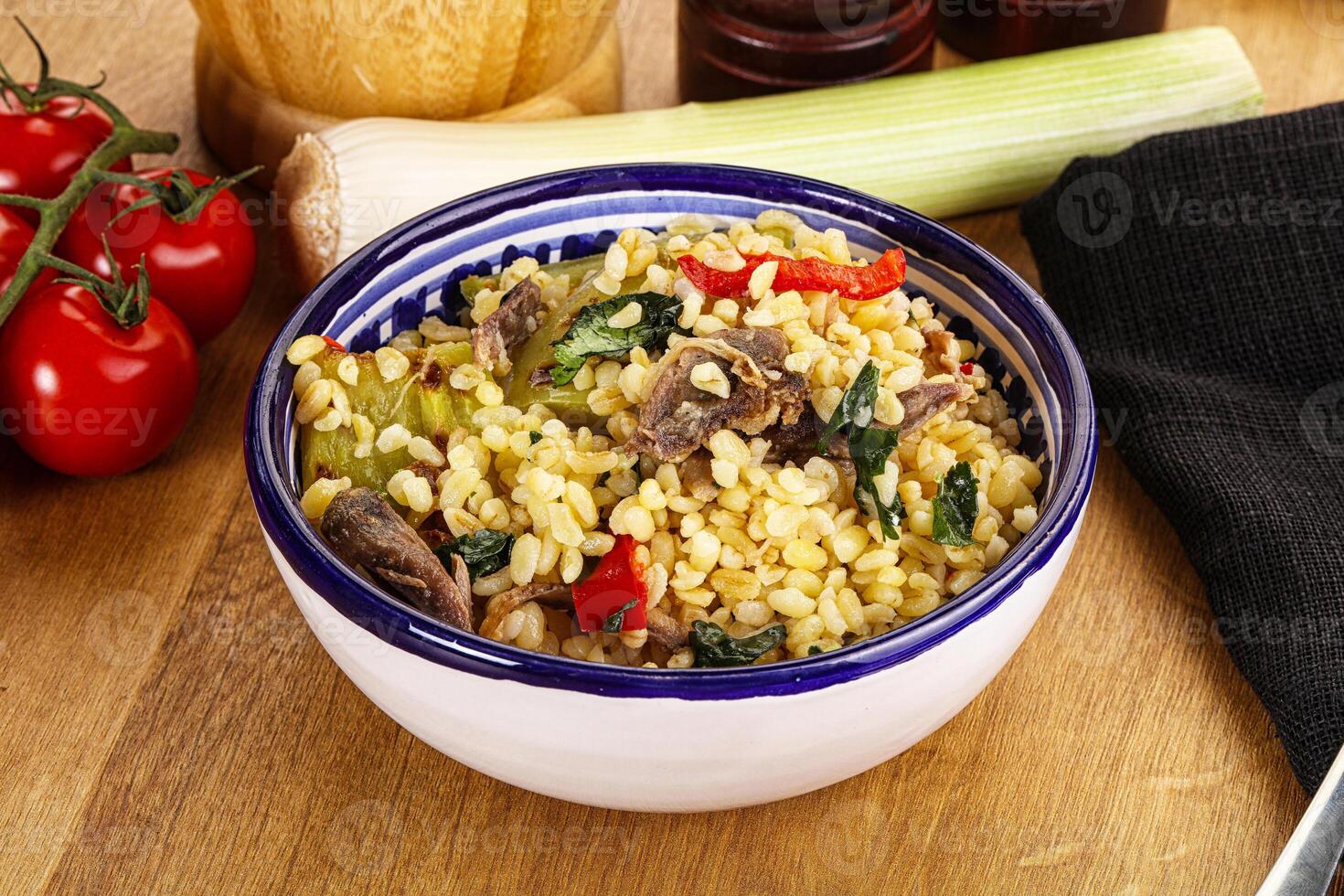 Bulgur with lamb and vegetables photo