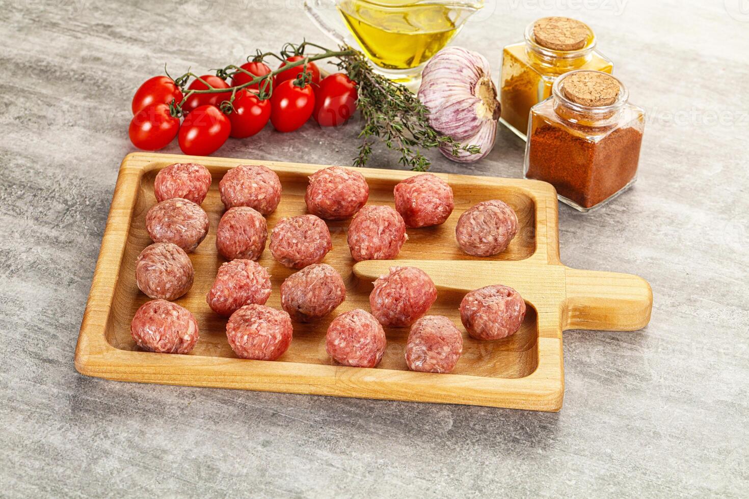Uncooked raw beef meatball minced photo
