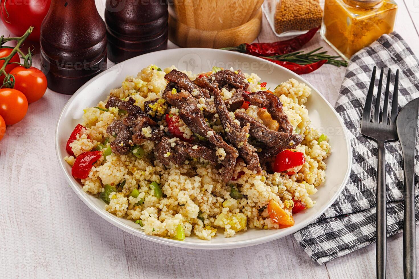 Traditional couscous with beef and vegetables photo