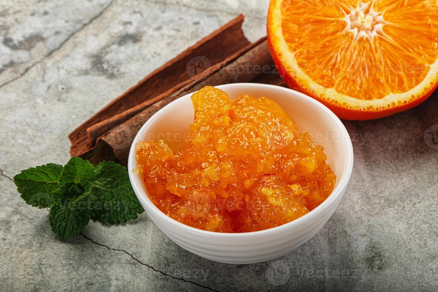 Tasty homemade Orange jam in the bowl photo