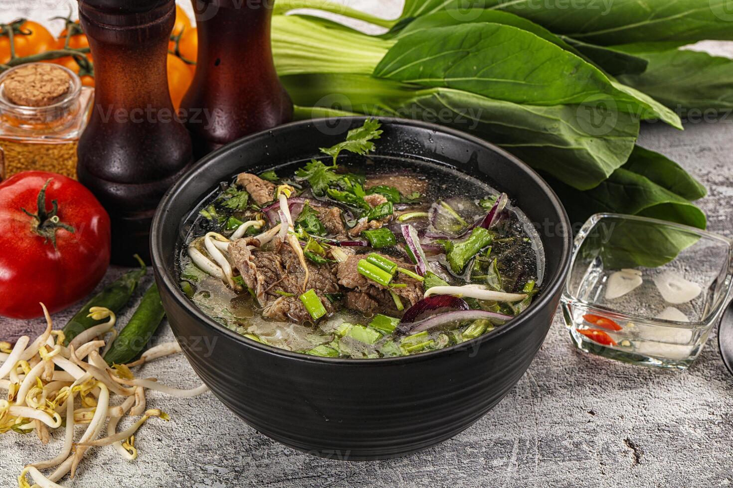 Vietnamese cuisine - Pho Bo soup with beef photo