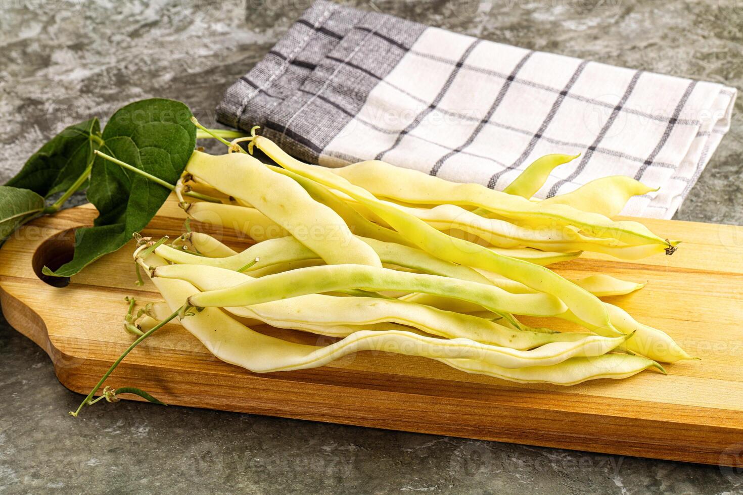 Raw green bean strings heap photo