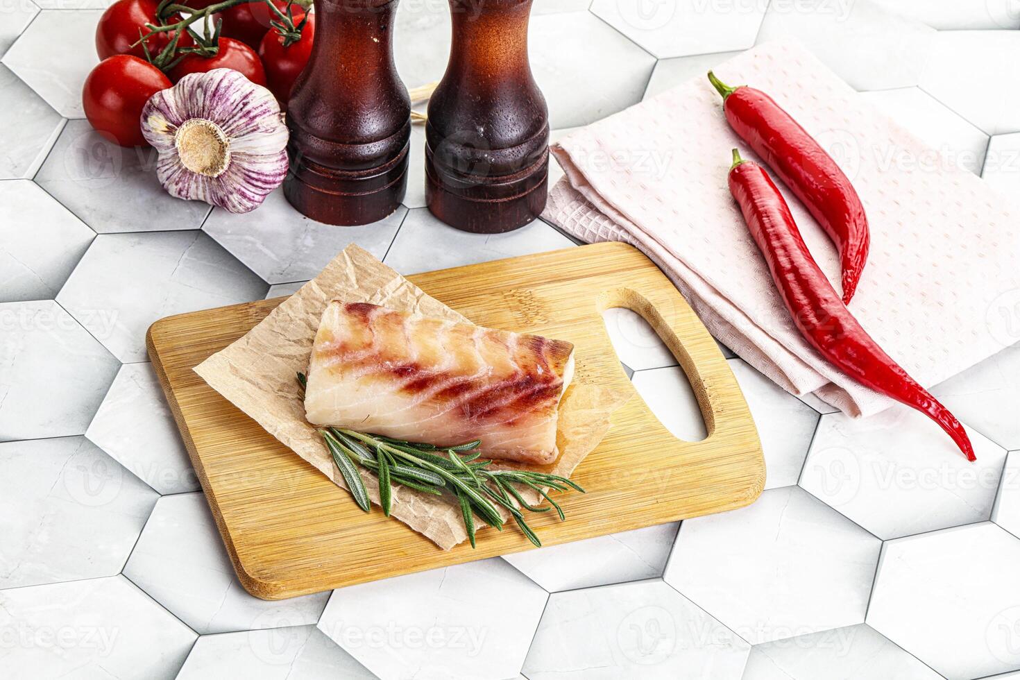 Raw cod fish steak for cooking photo